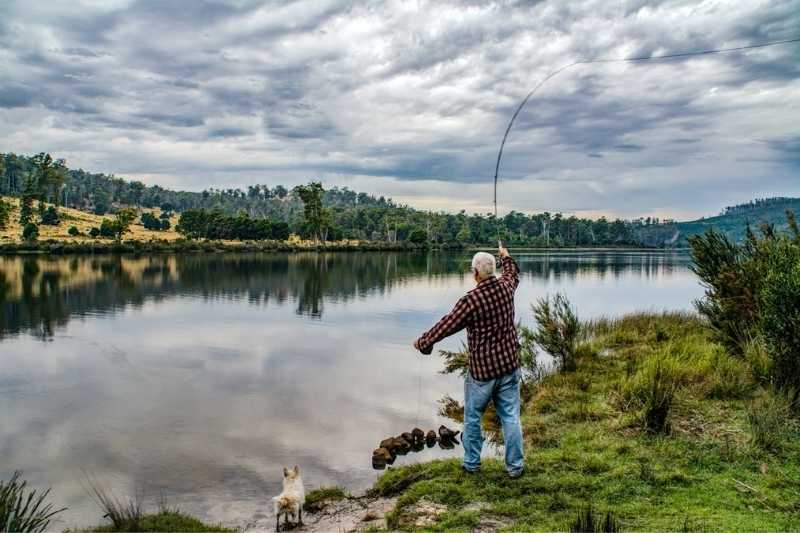 old man fly fishing